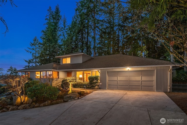 view of front facade featuring driveway and a garage