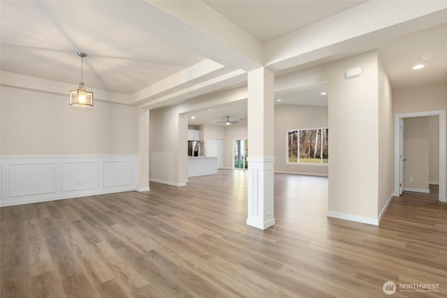 10707 212th St E, Graham, WA 98338 - unfurnished room with a decorative wall, recessed lighting, a ceiling fan, and light wood-style floors