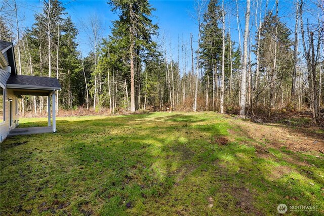 10707 212th St E, Graham, WA 98338 - view of yard with a view of trees