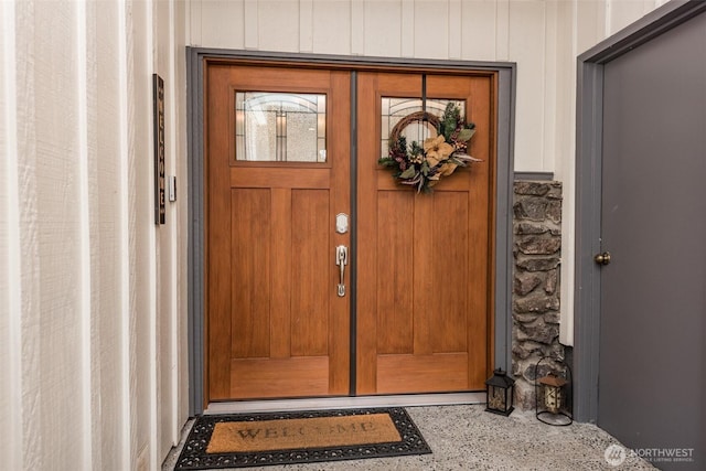 view of exterior entry with stone siding