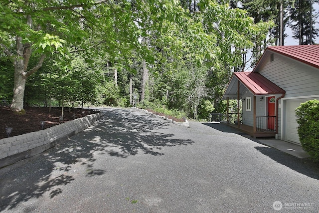 view of road with driveway