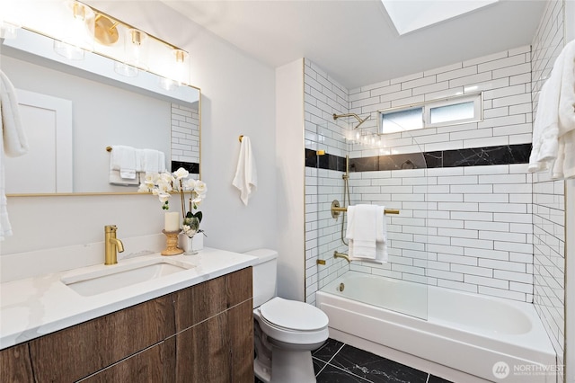 full bathroom featuring vanity, toilet, and washtub / shower combination