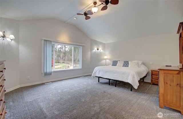 carpeted bedroom featuring baseboards and lofted ceiling