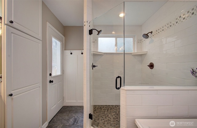 bathroom featuring a shower stall