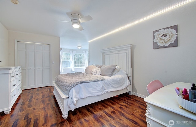 bedroom featuring a closet, ceiling fan, and dark wood-style flooring