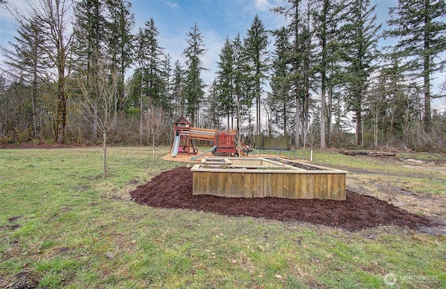 view of yard featuring a playground