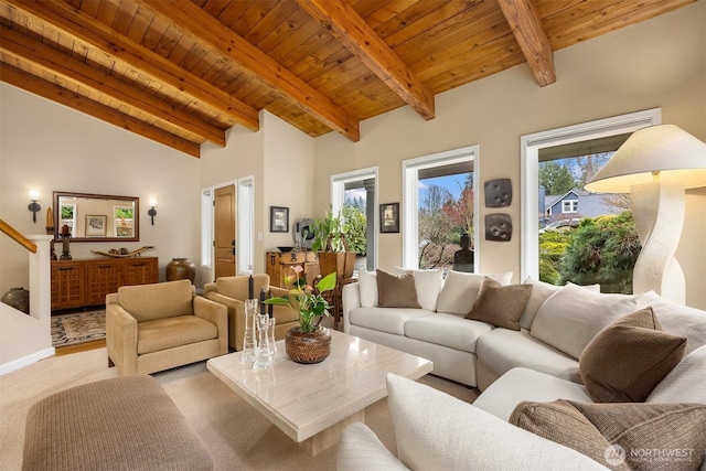 living area featuring wooden ceiling, stairway, vaulted ceiling with beams, and light carpet