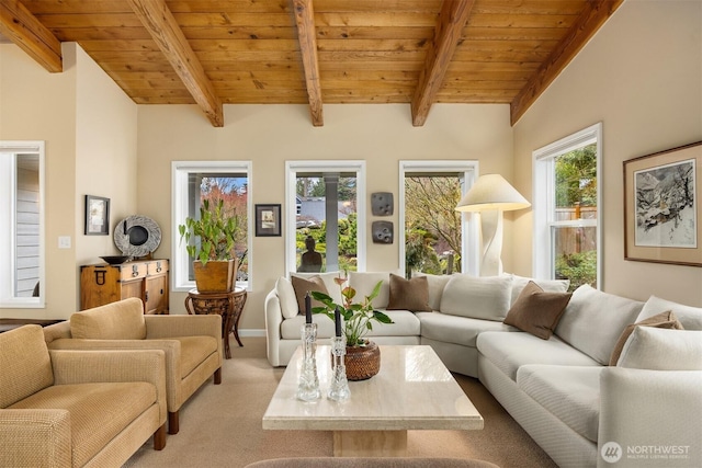 carpeted living room with wooden ceiling and beam ceiling