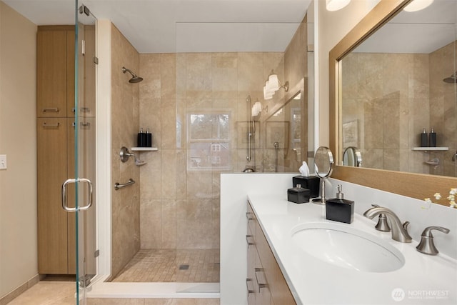 full bath featuring vanity and a stall shower