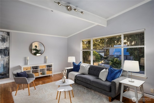 living room featuring vaulted ceiling with beams, baseboards, ornamental molding, and wood finished floors