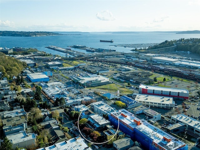 birds eye view of property featuring a water view