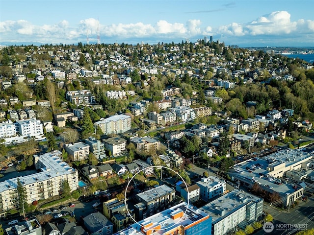 birds eye view of property with a view of city