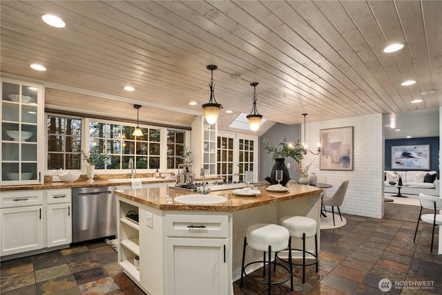 kitchen with wood ceiling, a kitchen island, white cabinetry, stainless steel dishwasher, and recessed lighting