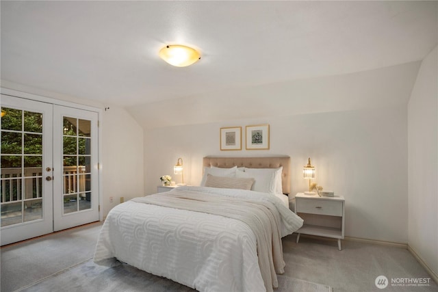 bedroom with lofted ceiling, access to exterior, carpet, and french doors