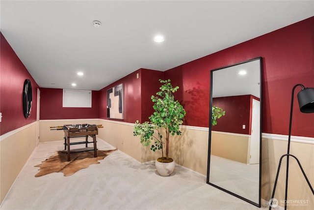 interior space with carpet floors and recessed lighting