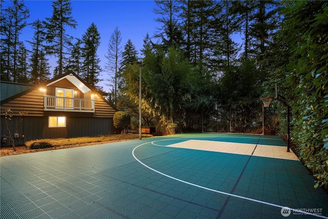 view of basketball court featuring basketball hoop