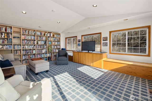 unfurnished living room featuring carpet floors, vaulted ceiling, and recessed lighting