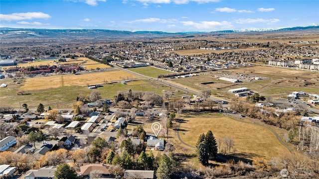 birds eye view of property featuring a rural view and a mountain view