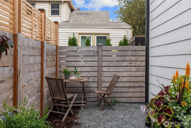 view of patio / terrace featuring fence