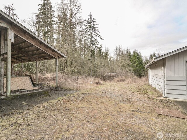 view of yard with a carport