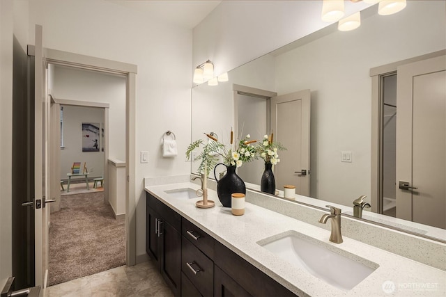 full bath with double vanity and a sink