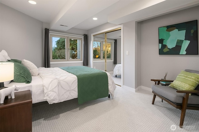 bedroom featuring visible vents, recessed lighting, a closet, carpet flooring, and baseboards