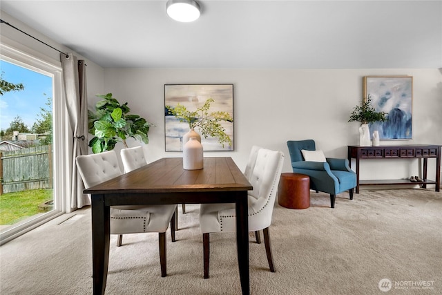 view of carpeted dining space