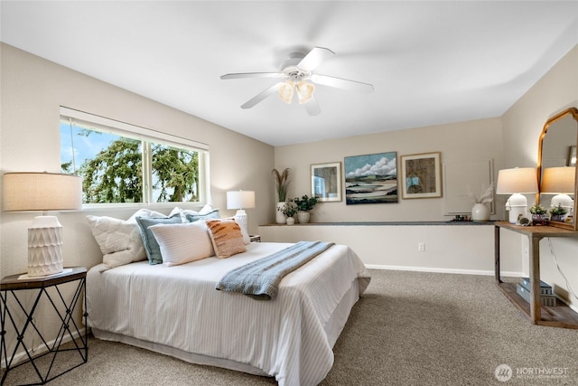 bedroom featuring ceiling fan, carpet flooring, and baseboards