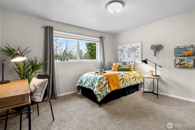 carpeted bedroom with baseboards