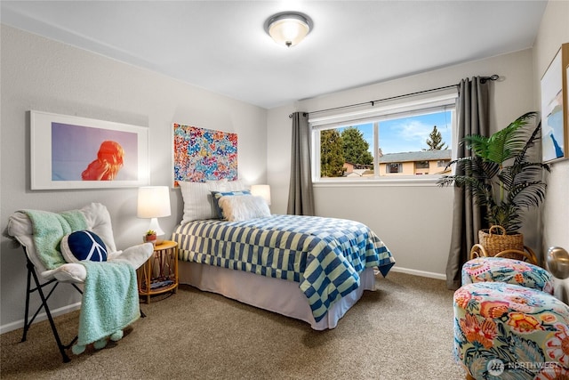 carpeted bedroom with baseboards