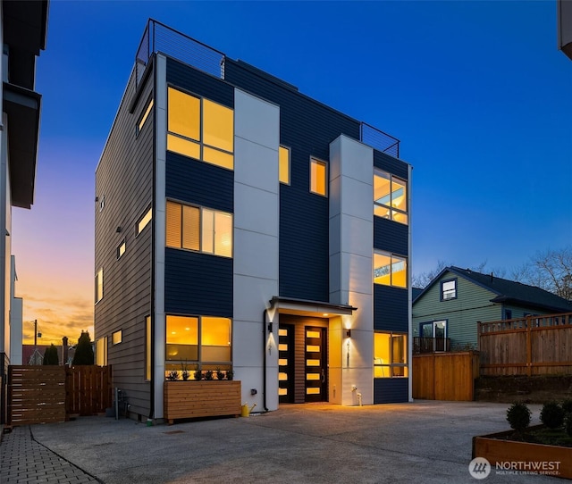 modern home with fence