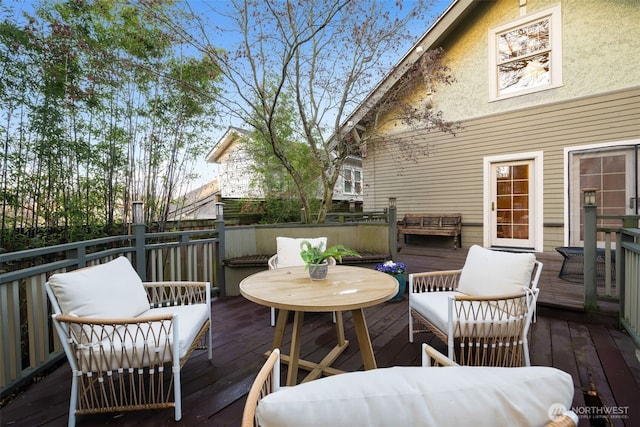 deck featuring outdoor lounge area