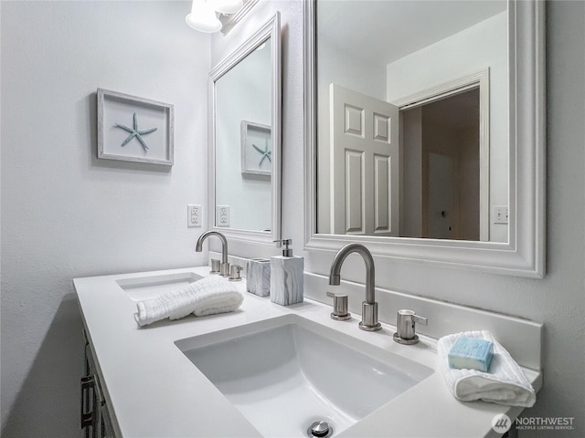 bathroom with double vanity and a sink