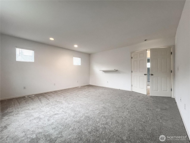 interior space with recessed lighting, baseboards, and carpet floors