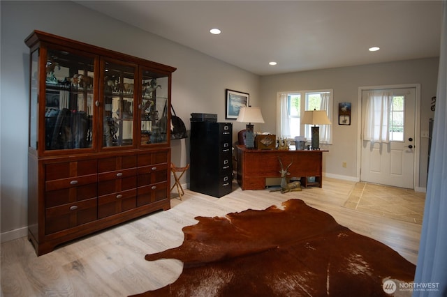 office area with light wood-type flooring, baseboards, and recessed lighting