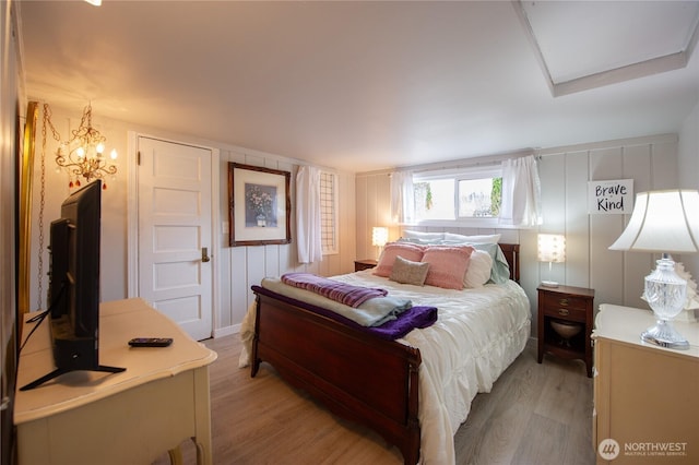 bedroom with light wood finished floors