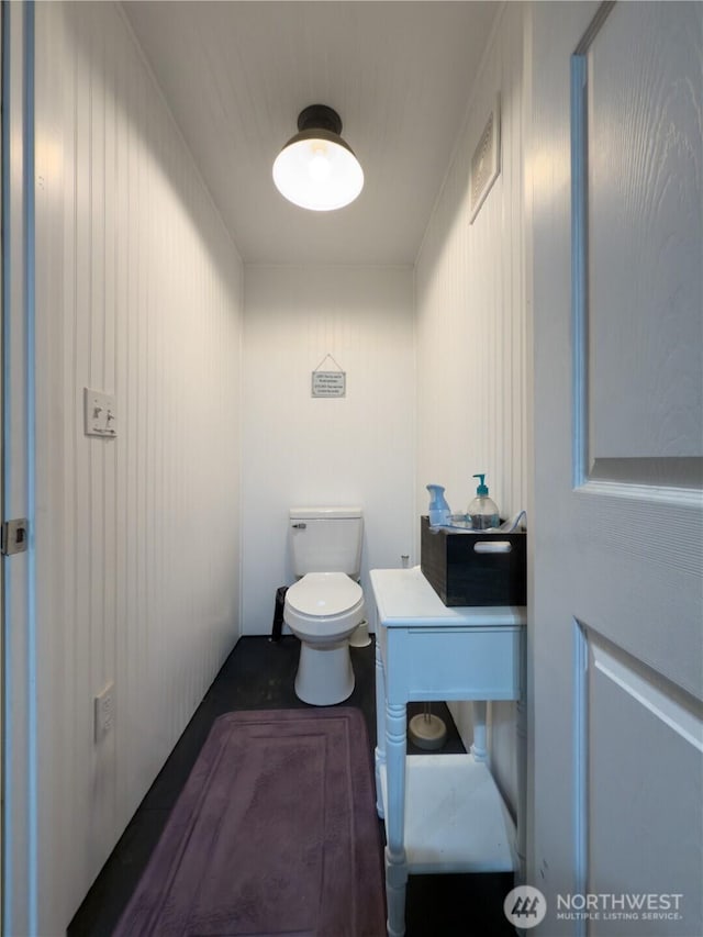 bathroom with toilet and vanity