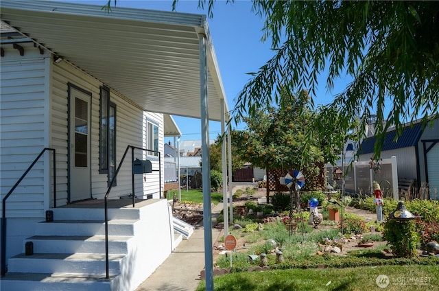 view of yard featuring an attached carport