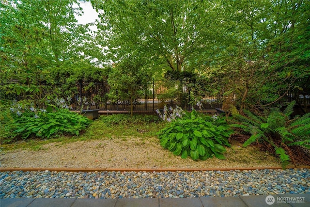 view of yard featuring fence