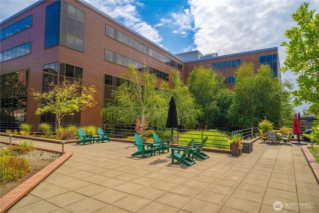 view of property's community featuring a patio