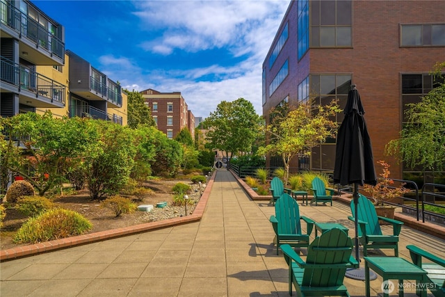 surrounding community featuring a patio area