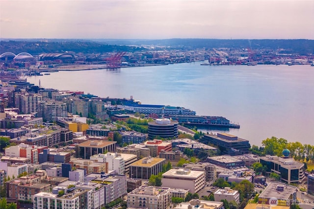 bird's eye view featuring a water view and a city view