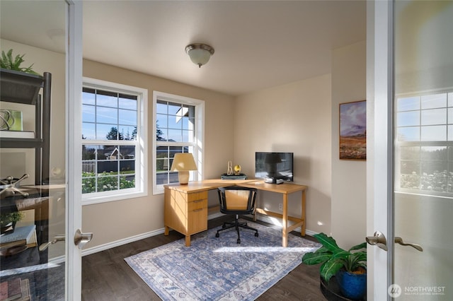 home office with baseboards, dark wood finished floors, and french doors