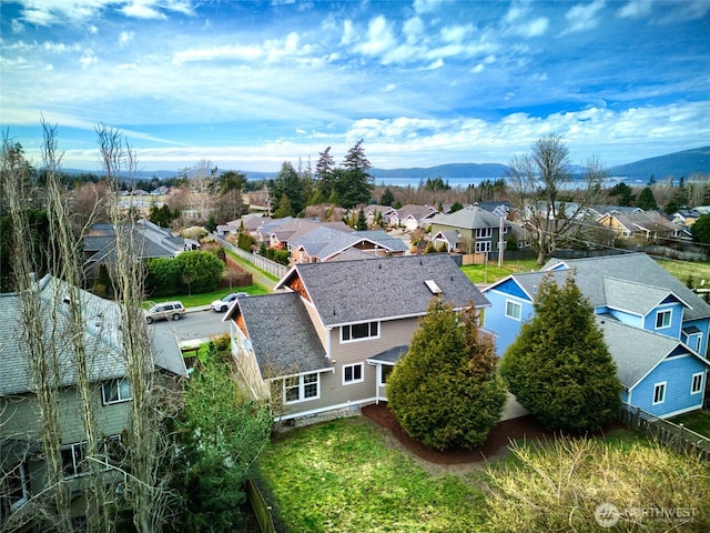 bird's eye view with a residential view and a mountain view