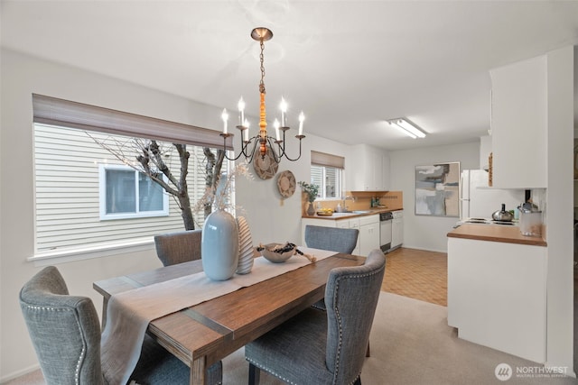 dining room featuring a notable chandelier