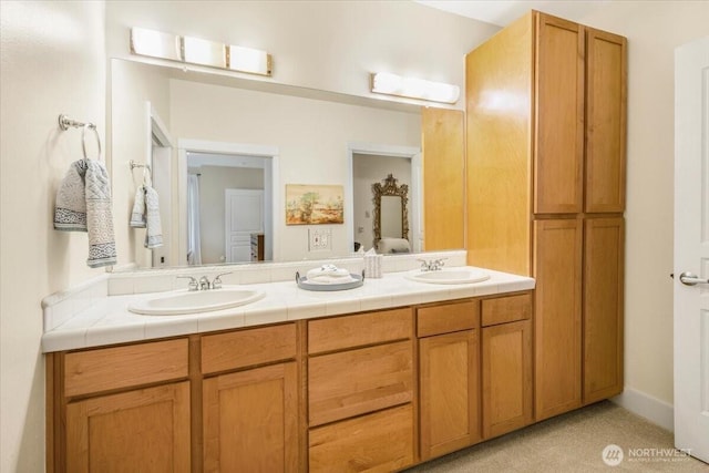 bathroom with double vanity and a sink