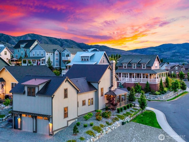 birds eye view of property featuring a residential view and a mountain view