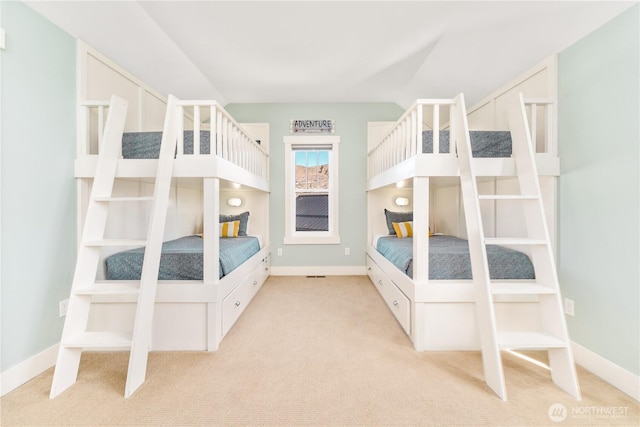 unfurnished bedroom featuring carpet floors and baseboards