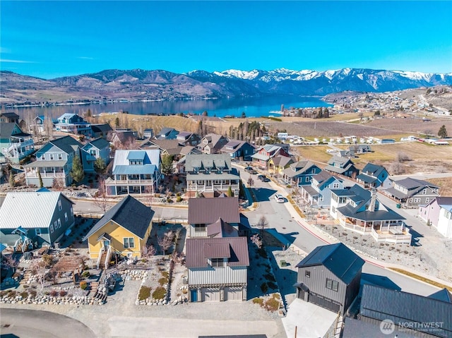 bird's eye view with a residential view and a mountain view