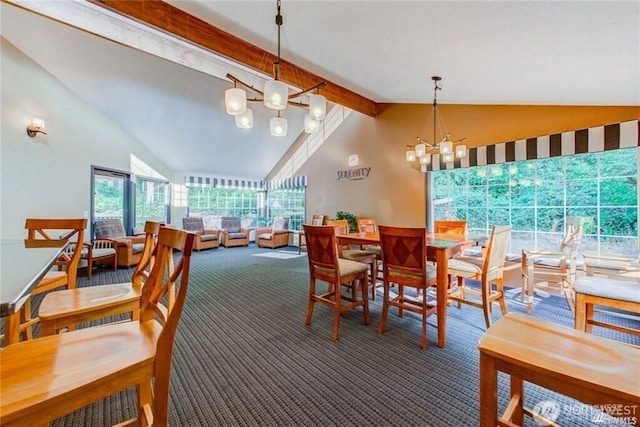 dining space with carpet, lofted ceiling with beams, and an inviting chandelier